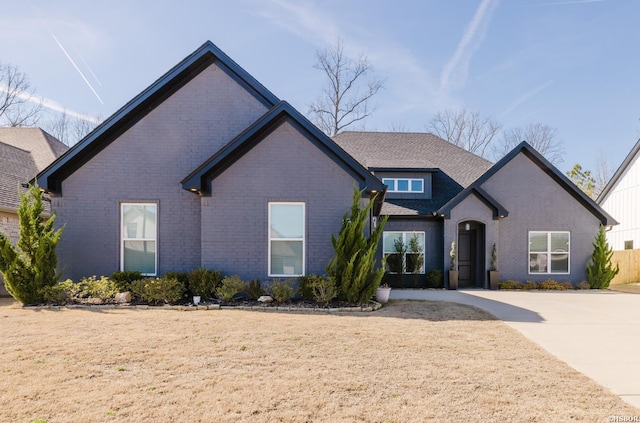 view of front of property with brick siding