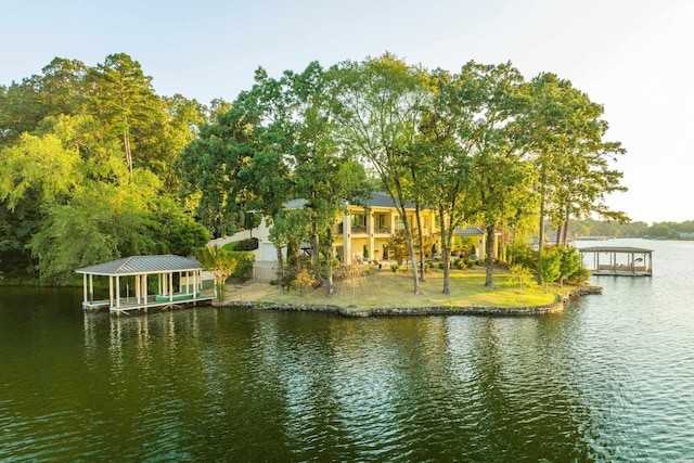 view of dock featuring a water view and boat lift