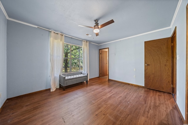 124 Primrose Ln, Pearcy, AR 71964 - unfurnished bedroom featuring wood finished floors, ornamental molding, baseboards, and ceiling fan
