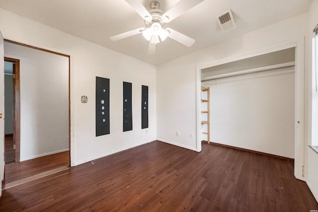 124 Primrose Ln, Pearcy, AR 71964 - unfurnished bedroom featuring wood finished floors, baseboards, ceiling fan, and a closet
