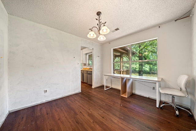 124 Primrose Ln, Pearcy, AR 71964 - dining room featuring a chandelier, dark wood-type flooring, a textured ceiling, and baseboards