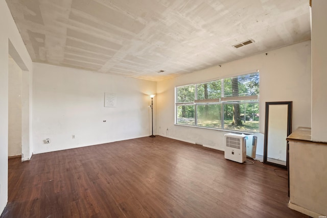 124 Primrose Ln, Pearcy, AR 71964 - empty room featuring dark wood-style flooring and baseboards