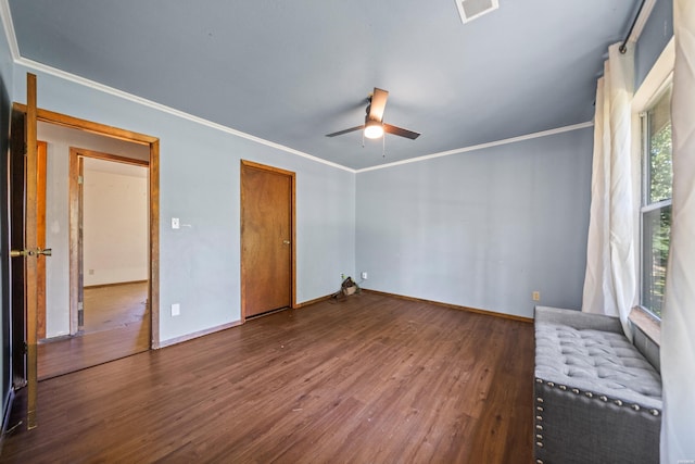 124 Primrose Ln, Pearcy, AR 71964 - empty room with wood finished floors, ceiling fan, baseboards, and crown molding