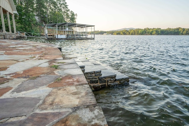 view of dock featuring a water view