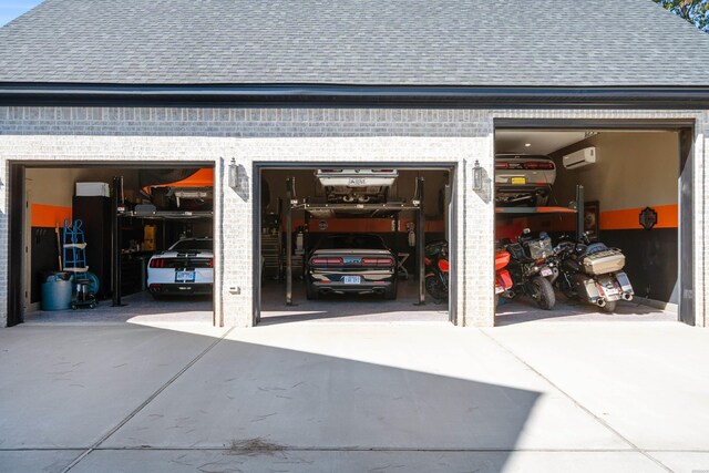 detached garage with a wall mounted AC