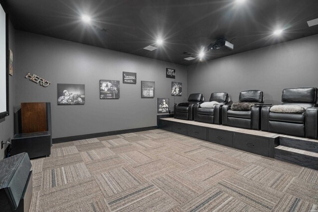 cinema room featuring recessed lighting, light carpet, and baseboards