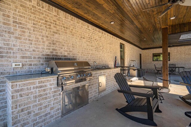 view of patio / terrace with outdoor dining space, ceiling fan, grilling area, and area for grilling