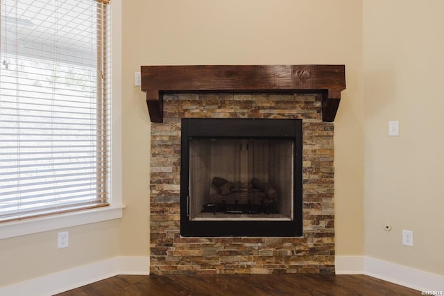 room details with wood finished floors and baseboards