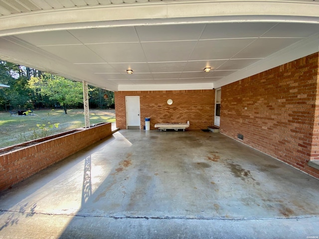 exterior space featuring a carport