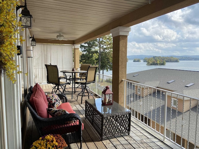 141 Central Ter Unit D, Hot Springs, AR 71913 - balcony featuring a ceiling fan, outdoor dining area, a water view, and a sunroom
