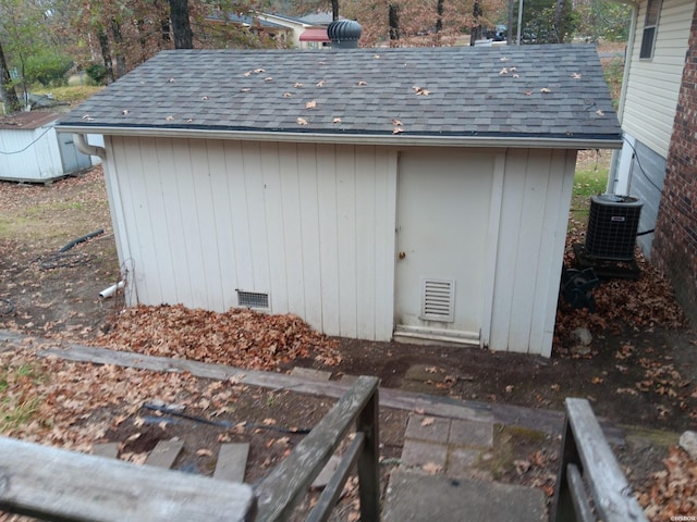 view of shed with central AC unit