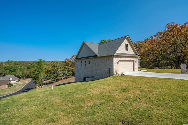 view of property exterior featuring a garage, concrete driveway, brick siding, and a lawn