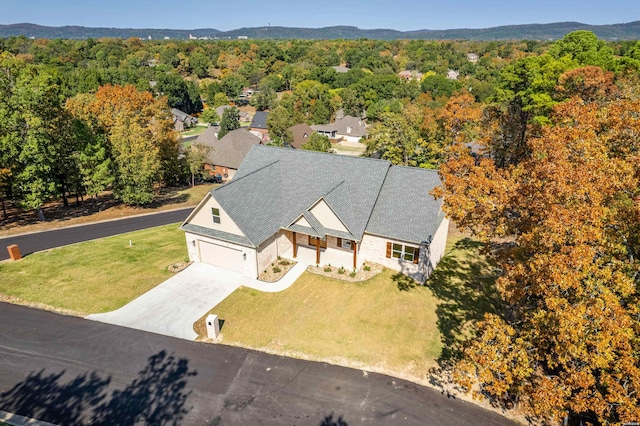 bird's eye view featuring a view of trees