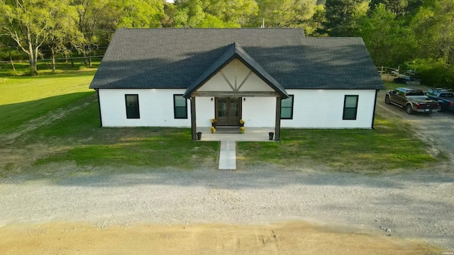 197 Country View Trl, Pearcy, AR 71964 - view of front facade with a shingled roof, a front yard, and french doors
