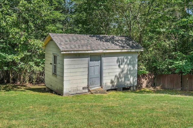 view of shed with fence