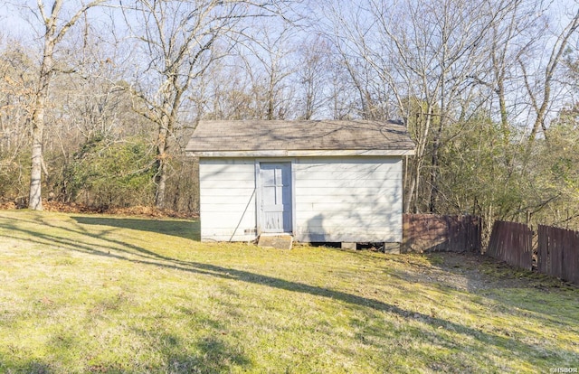 view of shed with fence