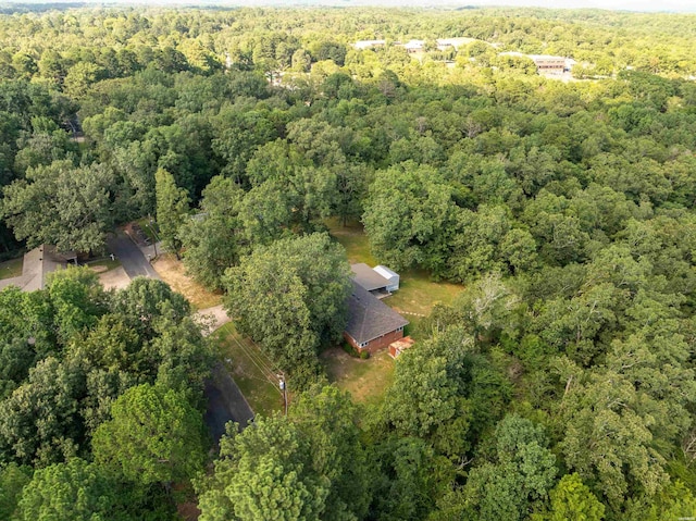 aerial view featuring a wooded view