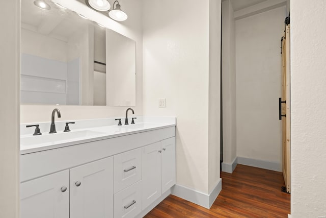 301 Walter St, Hot Springs, AR 71901 - full bath featuring wood finished floors, baseboards, and double vanity
