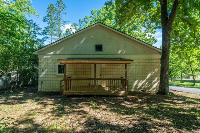 301 Walter St, Hot Springs, AR 71901 - view of front of house with a wooden deck and fence