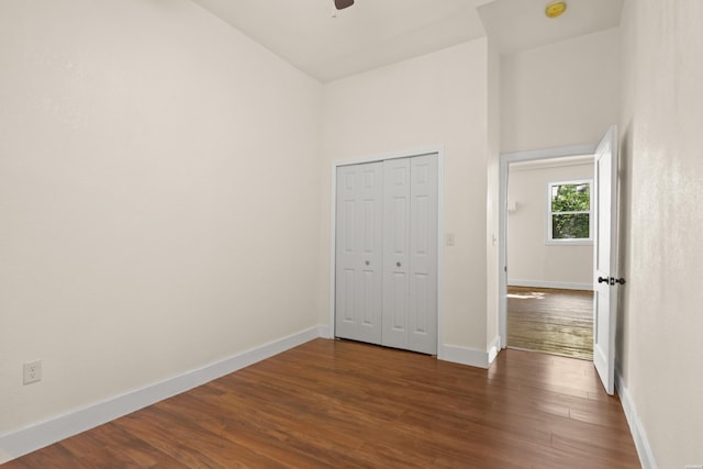301 Walter St, Hot Springs, AR 71901 - unfurnished bedroom featuring baseboards, dark wood-type flooring, a closet, and a ceiling fan