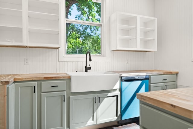 301 Walter St, Hot Springs, AR 71901 - kitchen with wooden counters, a sink, dishwashing machine, open shelves, and wood walls