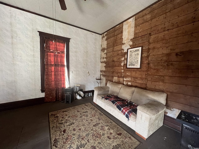 unfurnished living room featuring a ceiling fan