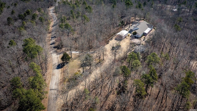 bird's eye view featuring a view of trees