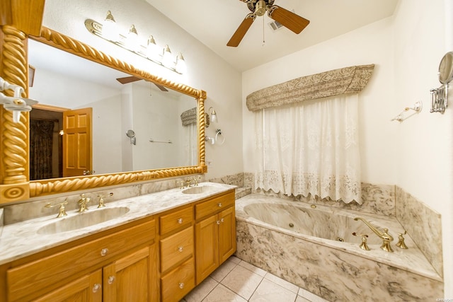 full bathroom featuring a sink, a ceiling fan, a jetted tub, and tile patterned floors