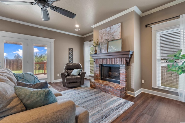115 Gatehills Pl, Hot Springs, AR 71913 - living room with dark wood finished floors, a brick fireplace, a ceiling fan, healthy amount of natural light, and crown molding