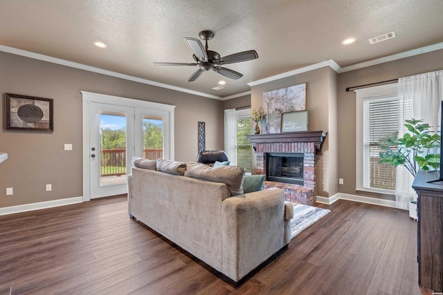115 Gatehills Pl, Hot Springs, AR 71913 - living room with ceiling fan, dark wood finished floors, a fireplace, a textured ceiling, and recessed lighting