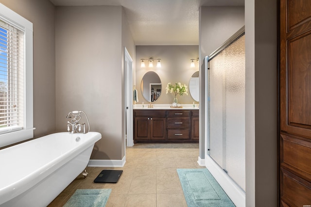 115 Gatehills Pl, Hot Springs, AR 71913 - bathroom featuring a stall shower, double vanity, a soaking tub, and tile patterned flooring