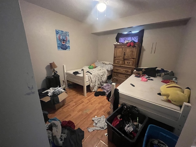 bedroom featuring wood finished floors