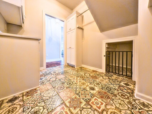 tiled empty room with baseboards