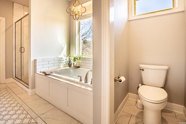 bathroom with toilet, marble finish floor, a bath, and a stall shower