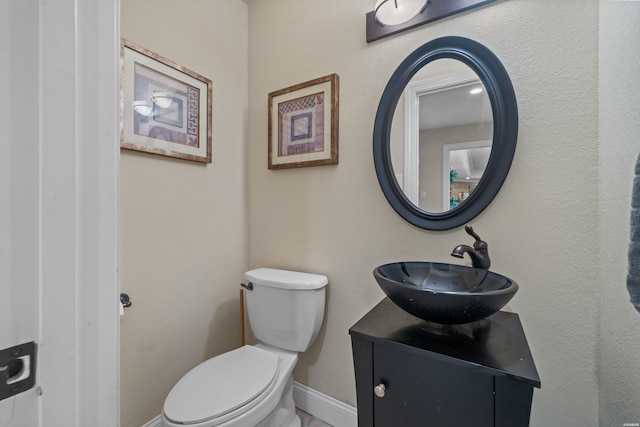213 Gregory Dr, Hot Springs, AR 71913 - half bath with toilet, vanity, and baseboards