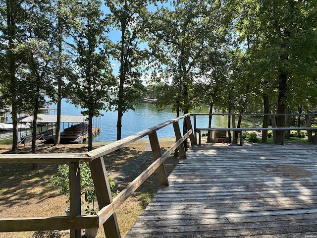 dock area with a water view