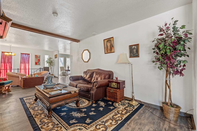 108 Helen St, Hot Springs, AR 71913 - living room featuring a chandelier, beamed ceiling, a textured ceiling, and wood finished floors