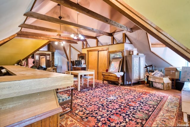 additional living space featuring vaulted ceiling with beams and a chandelier