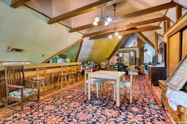 recreation room featuring lofted ceiling with beams and a bar