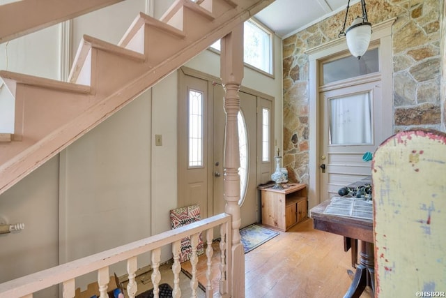 entryway with light wood finished floors