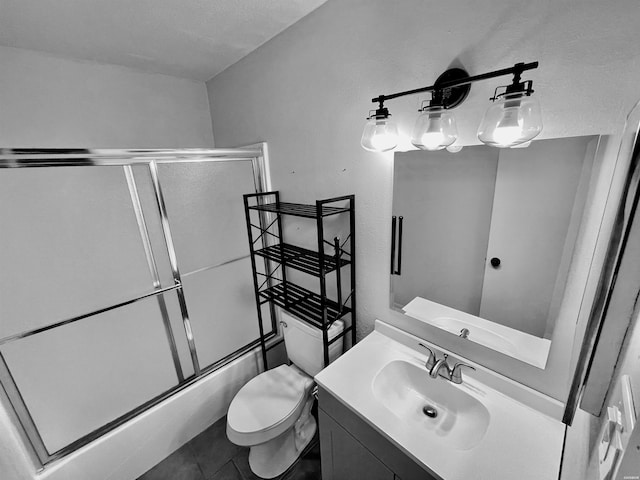 1135 Twin Pts Unit C, Hot Springs, AR 71913 - bathroom featuring vanity, bath / shower combo with glass door, and tile patterned flooring