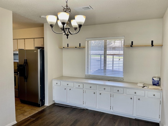 1135 Twin Pts Unit C, Hot Springs, AR 71913 - kitchen featuring stainless steel refrigerator with ice dispenser, a chandelier, dark wood-type flooring, white cabinetry, and light countertops