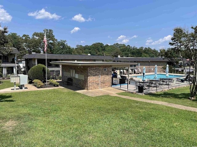 1135 Twin Pts Unit C, Hot Springs, AR 71913 - back of house featuring brick siding and a community pool