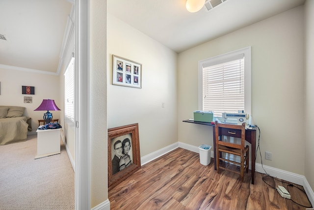203 Carriage Creek Ct, Hot Springs, AR 71901 - home office with healthy amount of natural light, wood finished floors, baseboards, and crown molding