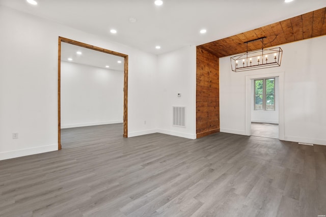 207 Hagen St, Hot Springs, AR 71913 - unfurnished room featuring recessed lighting, visible vents, a chandelier, and baseboards