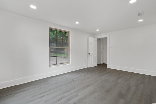 207 Hagen St, Hot Springs, AR 71913 - unfurnished room with recessed lighting, visible vents, wood finished floors, and baseboards