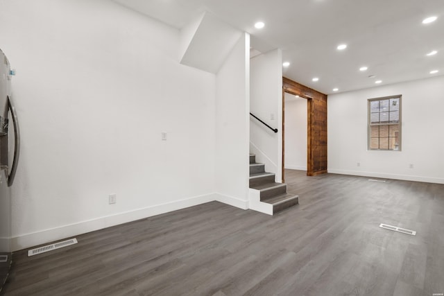 207 Hagen St, Hot Springs, AR 71913 - basement featuring recessed lighting, wood finished floors, stairway, baseboards, and visible vents