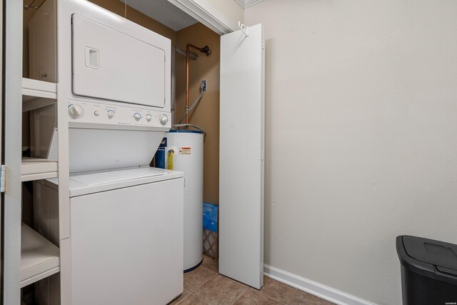 220 Mcdonald Loop, Hot Springs, AR 71913 - laundry room featuring stacked washer / dryer, electric water heater, and light tile patterned floors