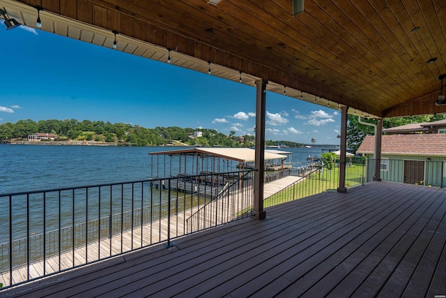 220 Mcdonald Loop, Hot Springs, AR 71913 - wooden terrace with boat lift, a water view, and a boat dock