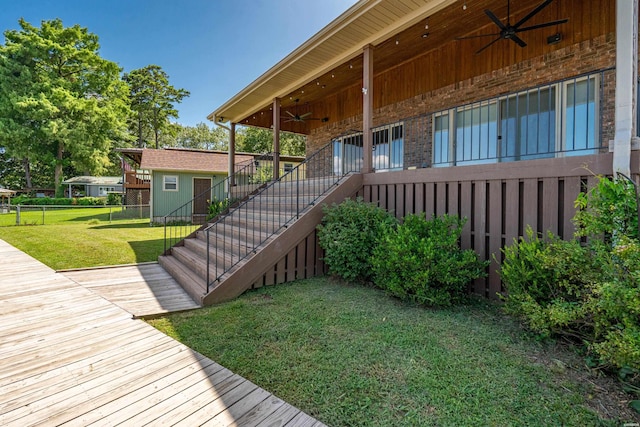 220 Mcdonald Loop, Hot Springs, AR 71913 - property entrance with a ceiling fan, a wooden deck, and brick siding